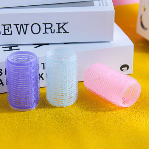 Tres rizadores de pelo adhesivos M.50