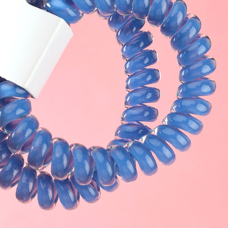 M42 two milk-blue series telephone cord hair ties in a box