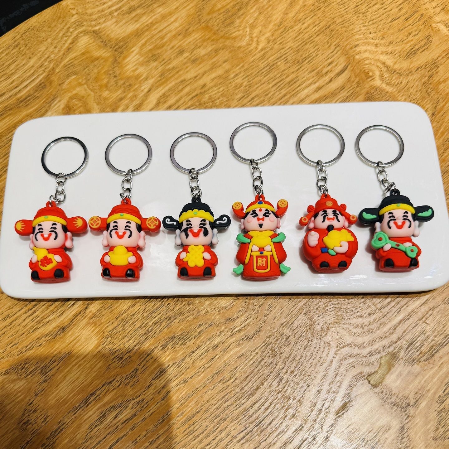 Wholesale of Festive God of Wealth Keychains Bag Pendants for Abundant Wealth Car Key Rings Small Gifts for New Year and New Year's Day M.72