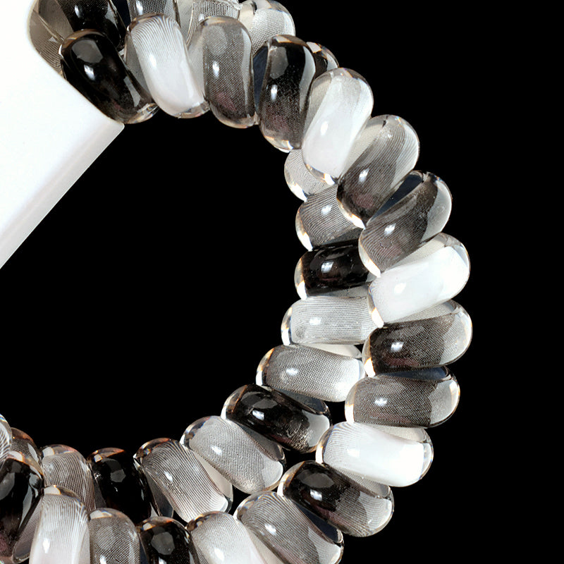 M42 two color-block telephone cord hair ties in a box