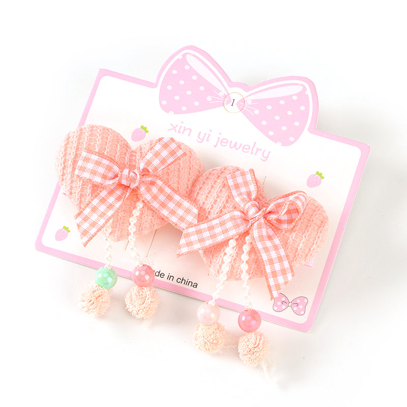 M42 Boxed Heart Bow Duck Clip Pair