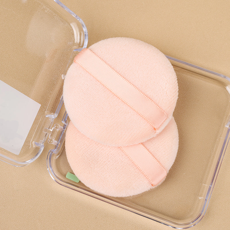 La caja YH-15 contiene dos borlas (para polvos sueltos) M.50