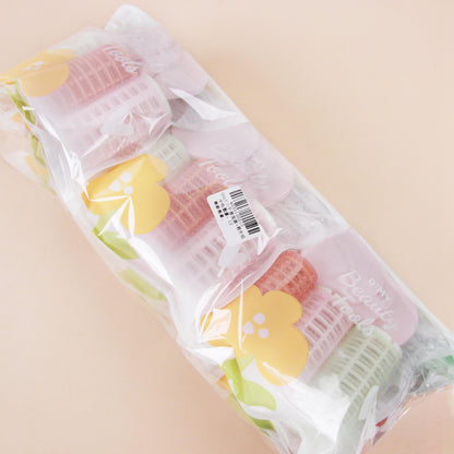 0017 Three curling irons + powder puff set M.50