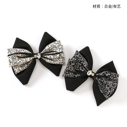 M42 Boxed Two-Tone Floral Bow Duck Clips