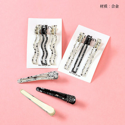 M42 Boxed set of three smoke-grey oil-dripping duck clips