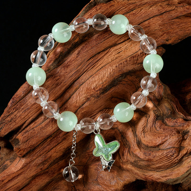 Pulsera con colgante de mariposa y tapa de leche de colores M.43 