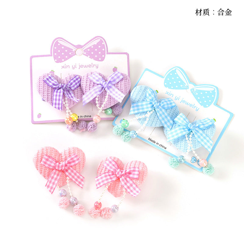 M42 Boxed Heart Bow Duck Clip Pair