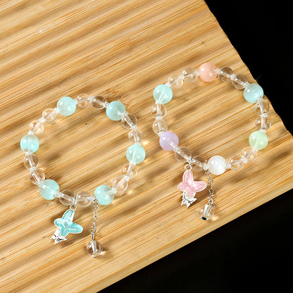 Pulsera con colgante de mariposa y tapa de leche de colores M.43 