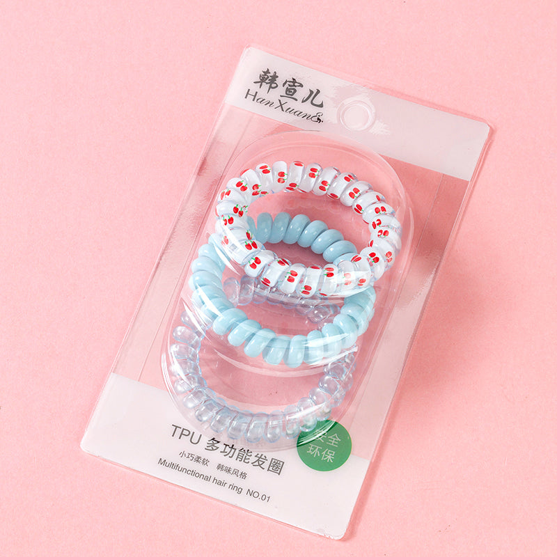 M42 three fresh-printed telephone cord hair ties