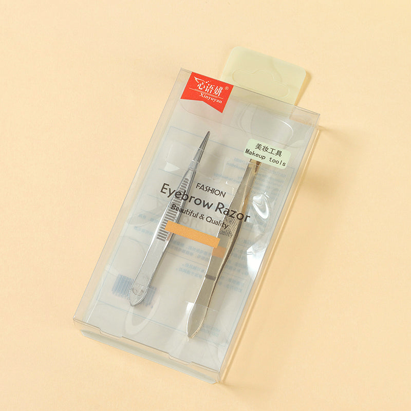 A box containing a set of two eyebrow tweezers M.50