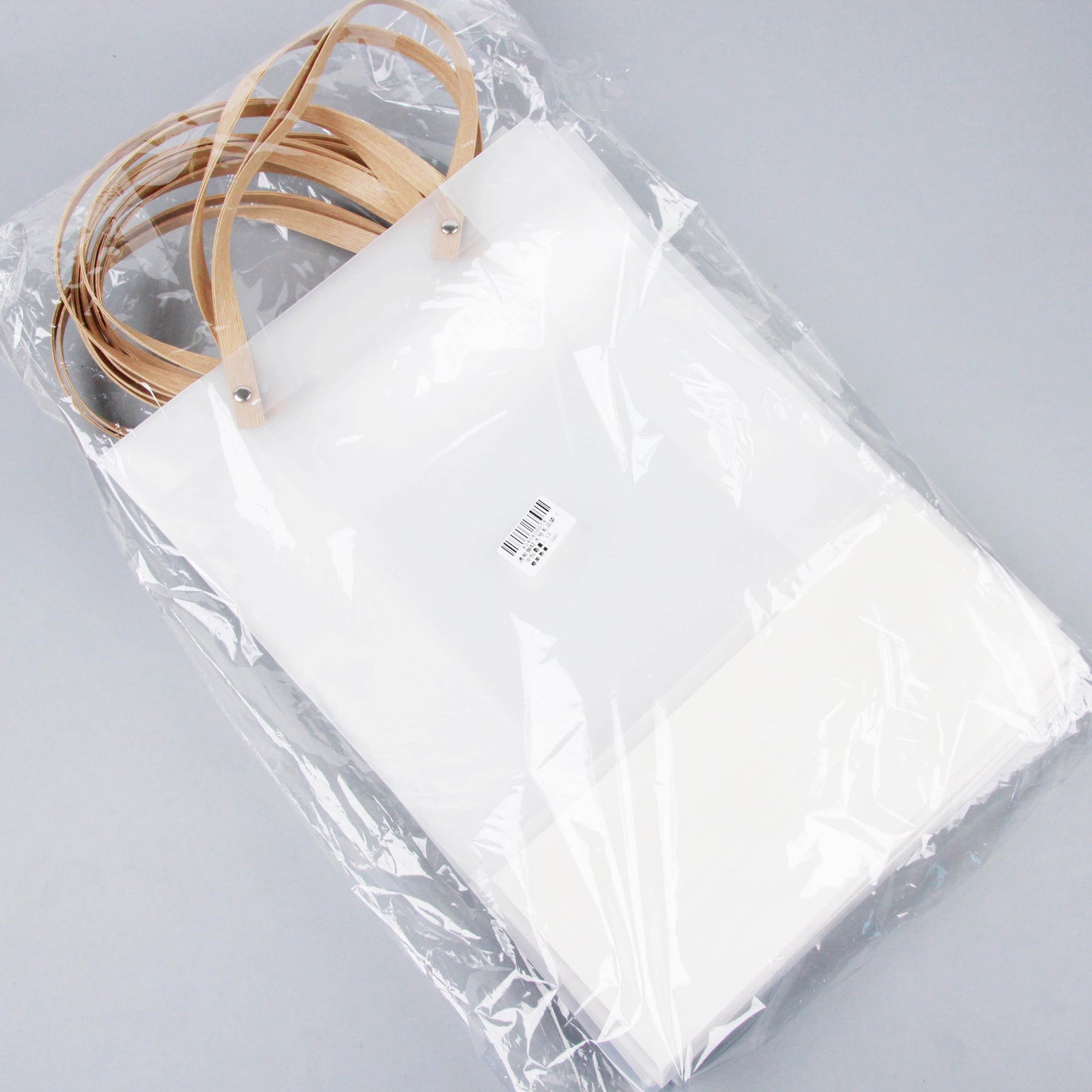 Large-sized vertical gift bag with transparent rivets M24 M.73