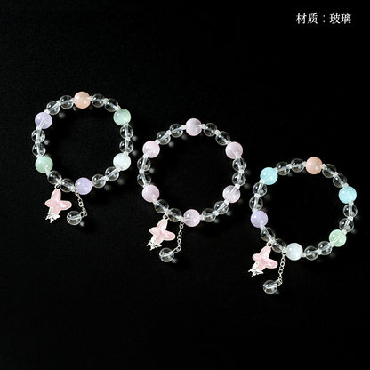 Pulsera con colgante de mariposa y tapa de leche de colores M.43 