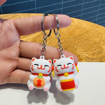 Wholesale of Cartoon Festive Fortune Cat Keychains 3D Soft Rubber Doll Bag Charms Car Key Rings Small Gifts M.72