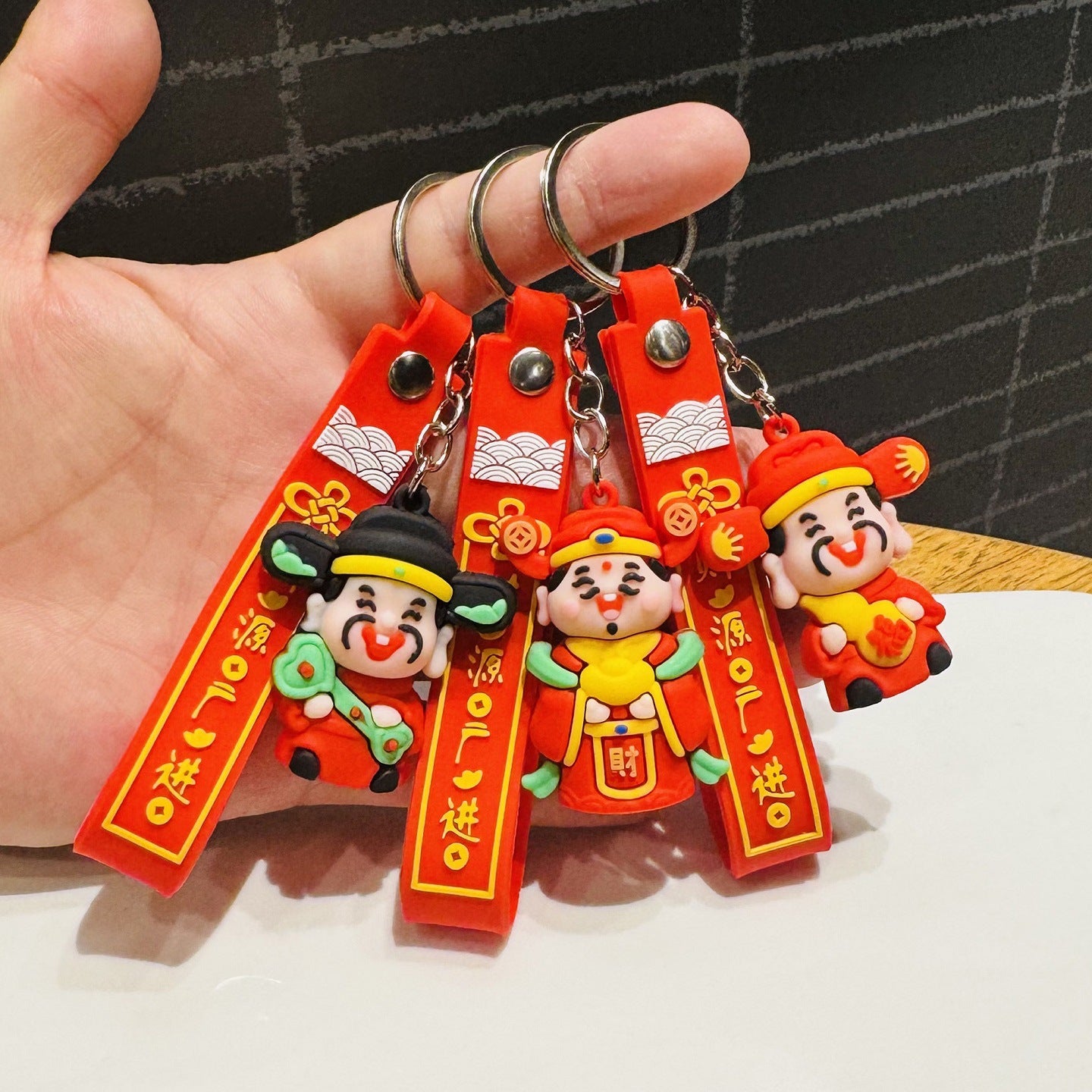 Wholesale of Festive God of Wealth Keychains Bag Pendants for Abundant Wealth Car Key Rings Small Gifts for New Year and New Year's Day M.72