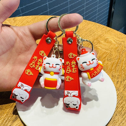 Wholesale of Festive Drum-Beating Lucky Cat Charms 3D Doll Keychains Car Key Rings & Bag Pendants Small Gifts M.72