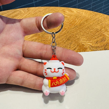 Wholesale of Cartoon Festive Fortune Cat Keychains 3D Soft Rubber Doll Bag Charms Car Key Rings Small Gifts M.72