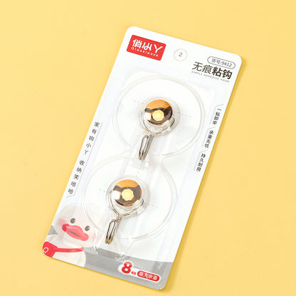 Ganchos adhesivos Qiaoxiaoya modelo 9412 - 2 piezas con diseño de hebilla dorada redonda M.16 