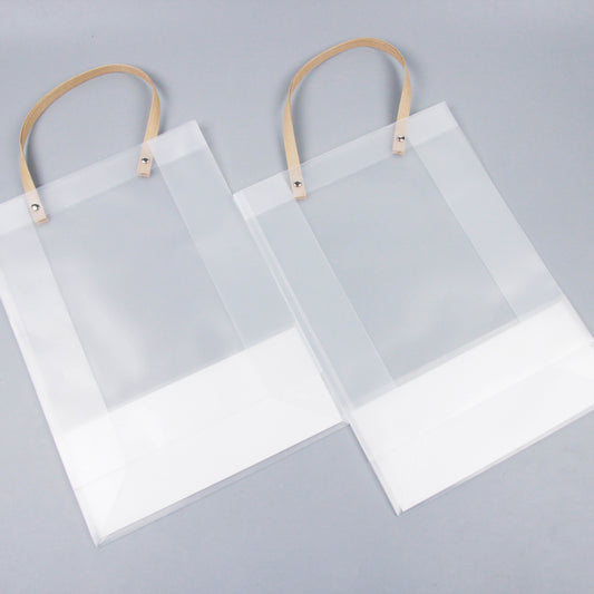 Large-sized vertical gift bag with transparent rivets M24 M.73