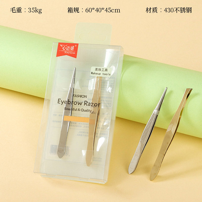 A box containing a set of two eyebrow tweezers M.50