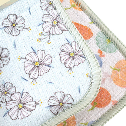 AMS-7310 check in two printed dishcloths M13