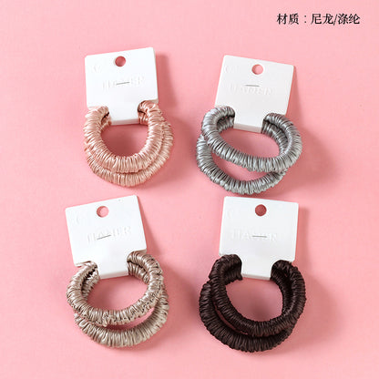 M42 two super-soft colored hair ties in a box