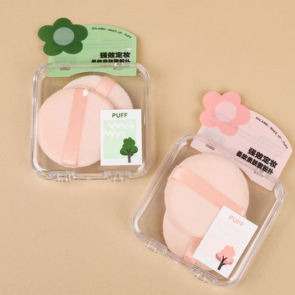 La caja YH-15 contiene dos borlas (para polvos sueltos) M.50 