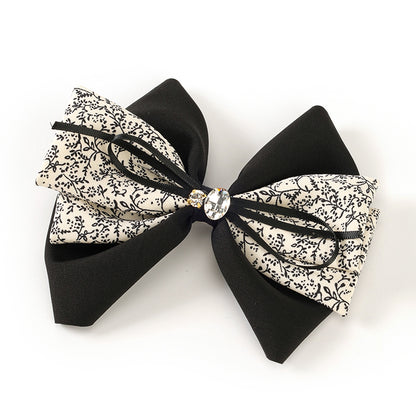 M42 Boxed Two-Tone Floral Bow Duck Clips