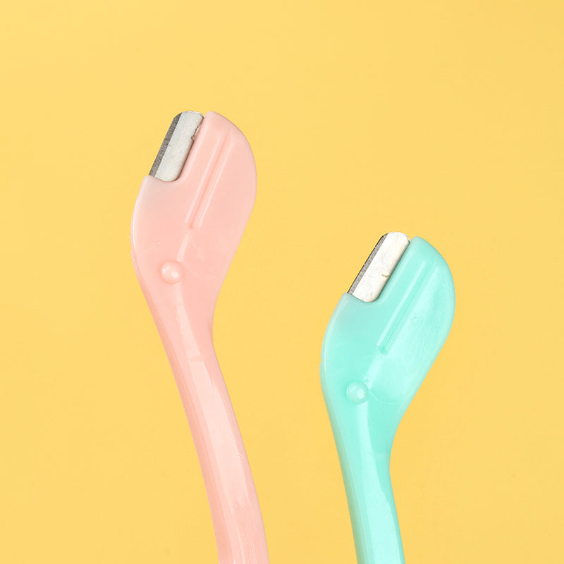 La caja S-556 contiene dos afeitadoras de cejas M.50 