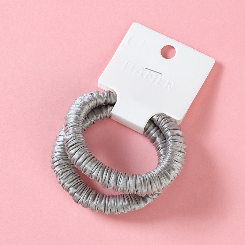 M42 two super-soft colored hair ties in a box