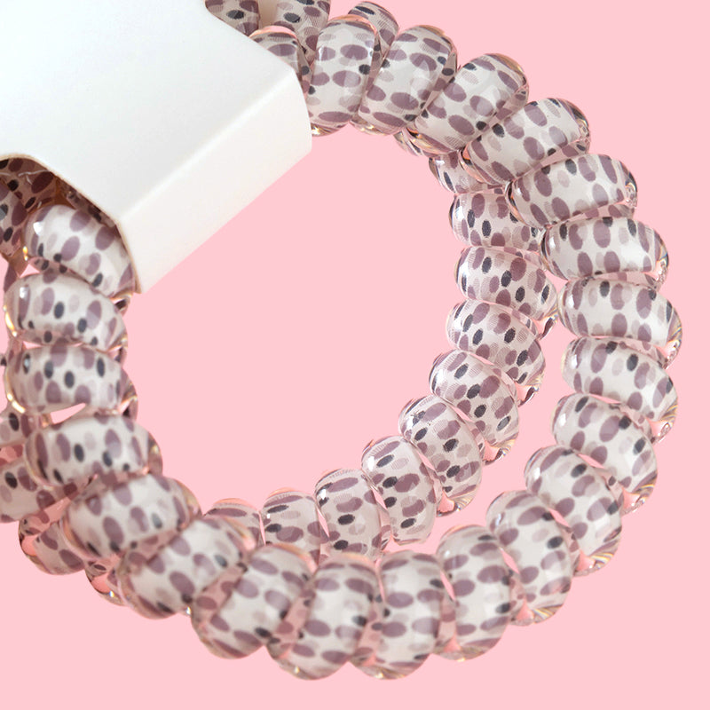 M42 two raindrop-printed telephone cord hair ties in a box