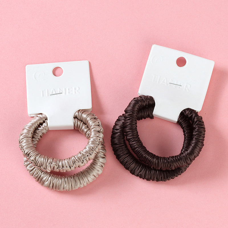 M42 two super-soft colored hair ties in a box